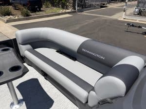 Bennington pontoon boat seating with plush cushions and durable design for leisure boating.