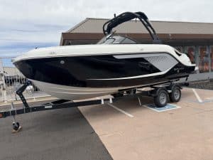 Modern Sea Ray bowrider boat on trailer, perfect for water sports and leisure.