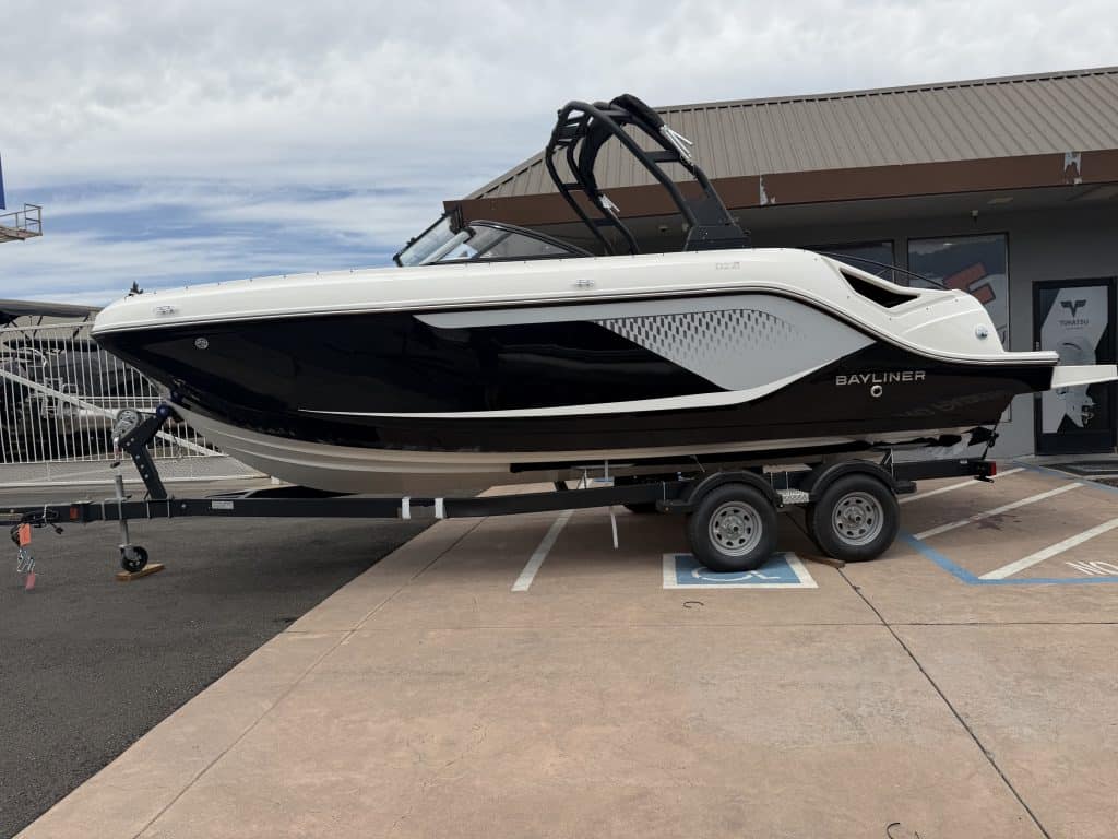 Luxury Bayliner boat on trailer at ASFB Marine dealership.