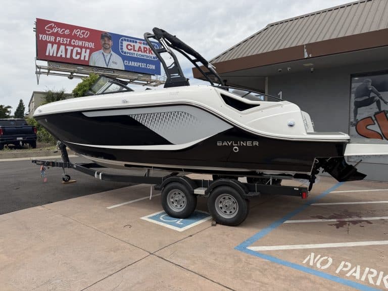 Modern Bayliner boat on trailer at ASFB Marine dealership.