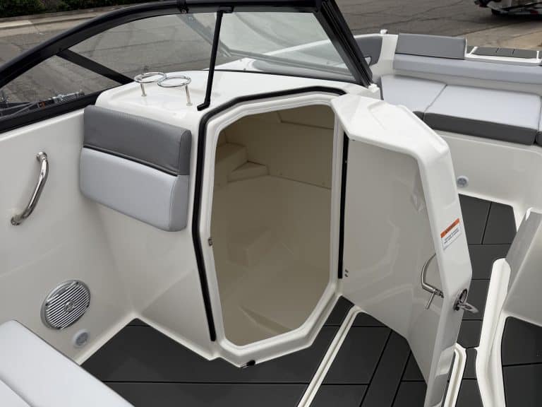 Opti boat cabin interior with spacious storage and modern design.