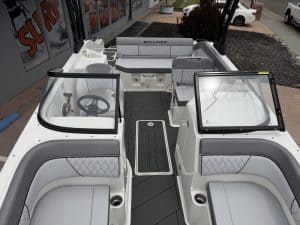 Modern boat interior with sleek seating and steering area, ideal for Opti Marine vessel upgrades.