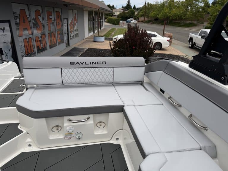 Modern Bayliner boat seating with comfortable cushions at ASFB Marine.