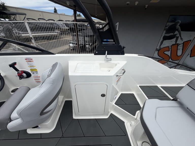 Opti boat console with seating for enhanced marine performance and comfort.