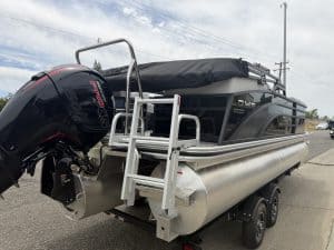 Pontoon boat with powerful outboard motor, ideal for leisure and fishing trips. Perfect for water ad.
