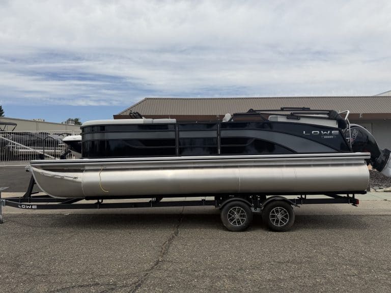 Modern Lowe pontoon boat on trailer at ASFB Marine dealership.