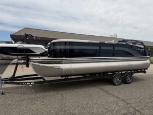 Luxury pontoon boat with sleek black and silver design, ready for water adventures. Perfect for fami.