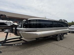 Luxury pontoon boat on trailer for sale at ASFB Marine dealership.