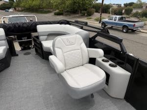 Luxury boat captain chair with white upholstery, perfect for comfort and style on a pontoon boat.