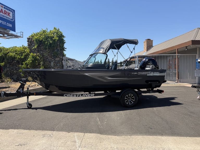 2026 Crestliner 1850 Kodiak boat with Mercury 115HP engine on trailer.