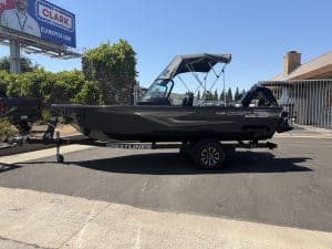 Crestliner 1850 Kodiak boat with Mercury 115HP engine on trailer.