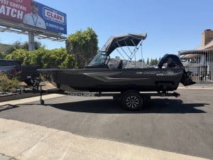 Crestliner 1850 Kodiak boat with Mercury 115HP engine on trailer.