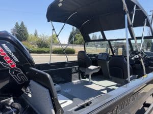 Interior view of Crestliner 1850 Kodiak boat with Mercury outboard.
