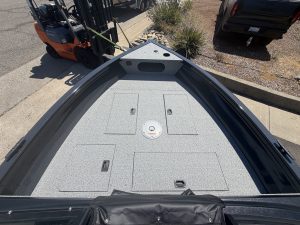 Interior view of Crestliner 1850 Kodiak boat with storage compartments.