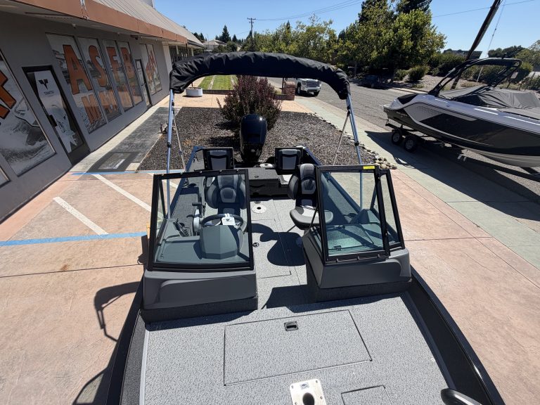 Lowe FM 1625 WT boat with Mercury 90HP engine at dealership.