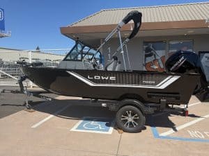 Lowe FM 1625 WT boat with Mercury 90HP outboard motor on trailer.