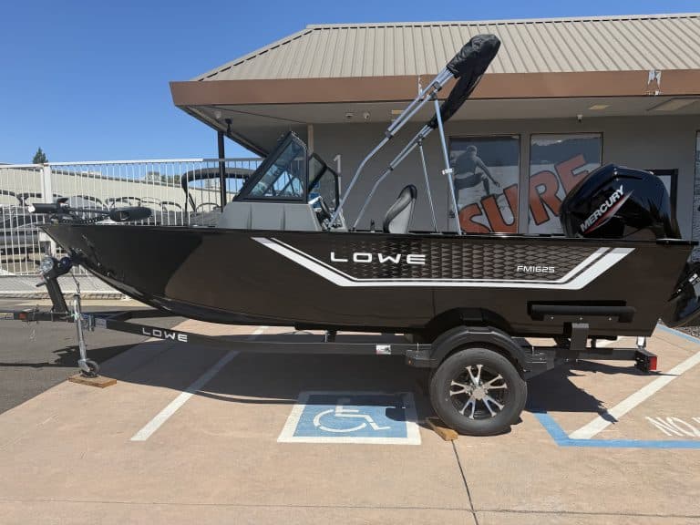 Lowe FM 1625 WT boat with Mercury 90HP outboard motor on trailer.