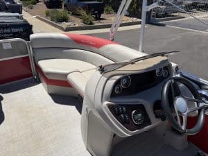 Boat interior with steering wheel and seating from 2022 South Bay LE 22FT.