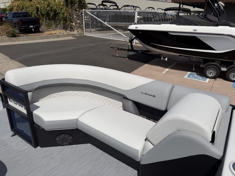 Luxury boat seating with white cushions on Lowe SS 230 WV model.