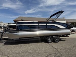 Lowe SS 230 WV pontoon boat with Mercury 150HP engine on trailer.