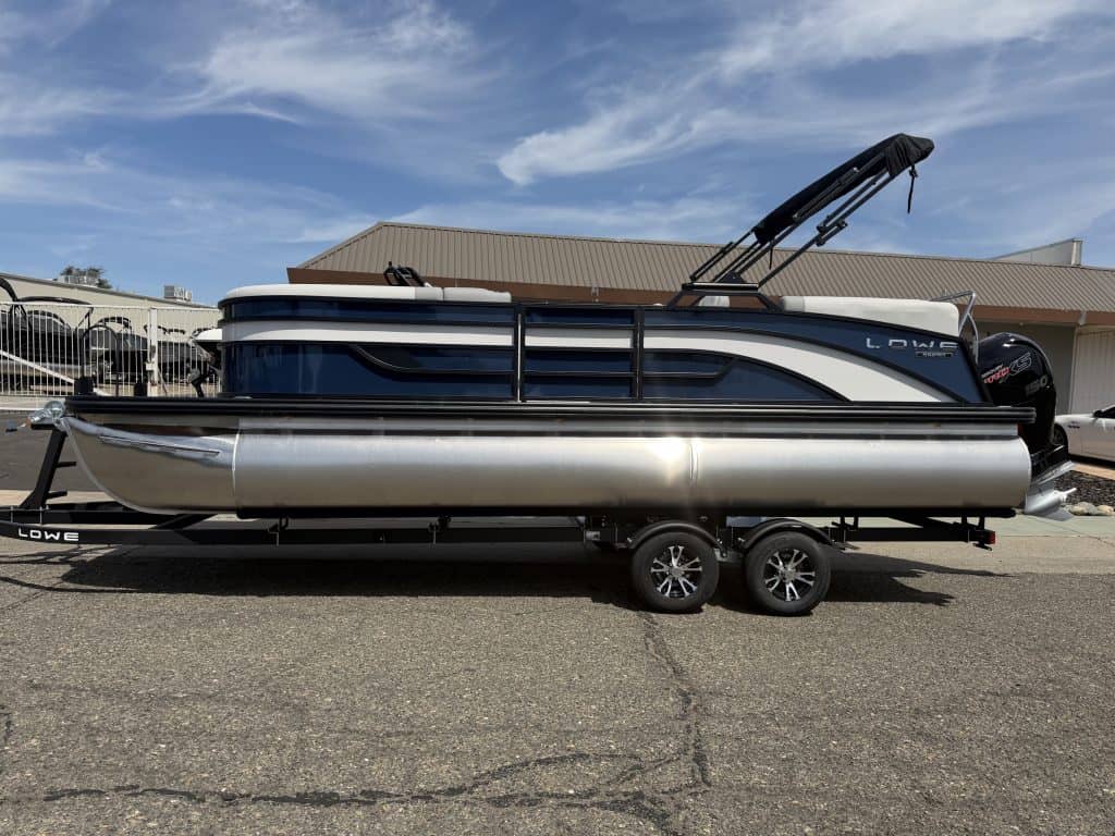 Lowe SS 230 WV pontoon boat with Mercury 150HP engine on trailer.