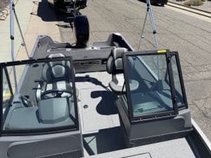 Lowe FM 1625 WT boat interior with seating and steering console.