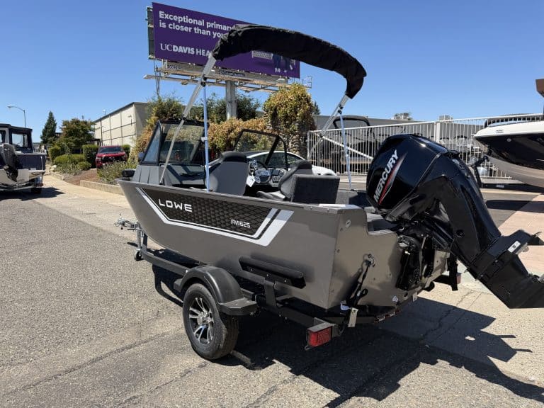 Lowe FM 1625 WT boat with Mercury 60HP outboard motor on trailer.