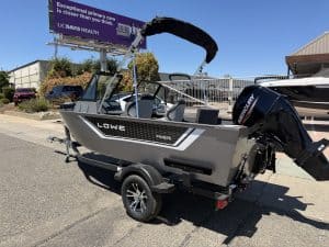 Lowe FM 1625 WT boat with Mercury 60HP outboard motor on trailer.