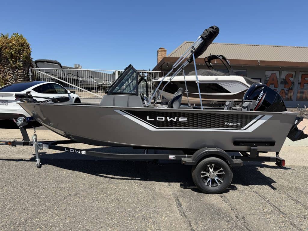 Lowe FM 1625 WT boat with Mercury 60HP engine on trailer.