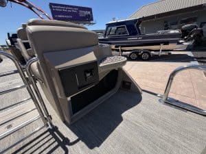 Bennington 25FT Q pontoon boat with seating and storage features.