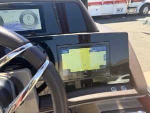 Close-up of boat navigation system display on a Bennington 25FT Q 450HP.