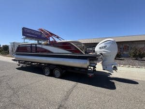 Bennington 25FT Q pontoon boat with Yamaha engine on trailer.