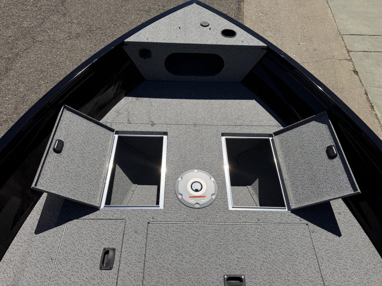 Interior view of Crestliner 1650 Kodiak fishing boat with storage compartments.