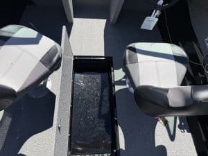 Interior view of Crestliner 1650 Kodiak fishing boat with seats and storage.