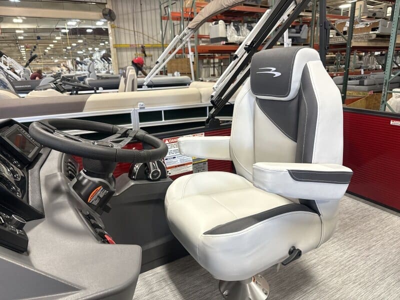 Comfortable boat captain's seat for Bennington S 22 with Mercury 150HP engine.