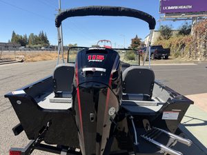 Lowe FM 1775 WT boat with Mercury 115HP Pro Xs engine on display.