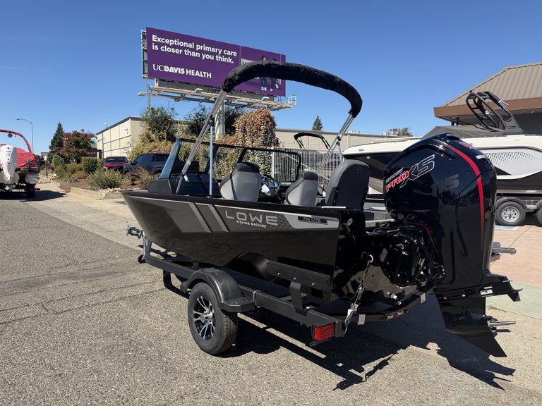 Lowe FM 1775 WT boat with Mercury 115HP outboard motor on trailer.