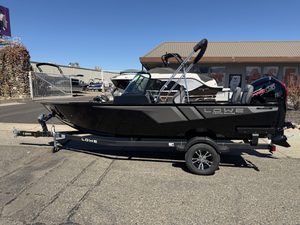 Lowe FM 1775 WT boat with Mercury 115HP outboard motor on trailer.