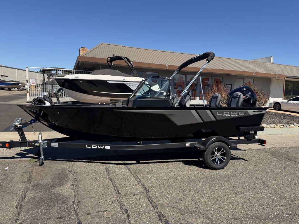 Lowe FM 1775 WT boat with Mercury 115HP engine on trailer.