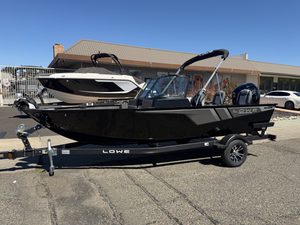 Lowe FM 1775 WT boat with Mercury 115HP Pro Xs engine on trailer.