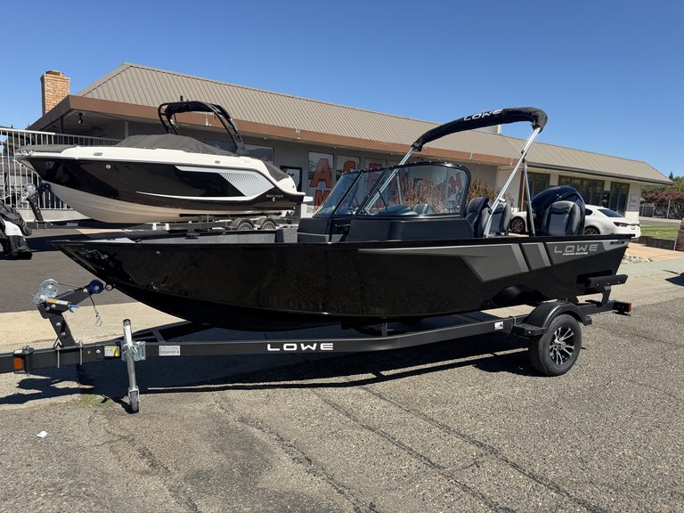 Lowe FM 1775 WT boat with Mercury 115HP engine on trailer.
