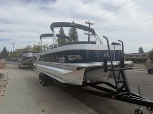 Luxury Avalon Cata pontoon boat on trailer at ASFB Marine.