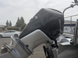Mercury outboard motor on a boat for sale at ASFB Marine.