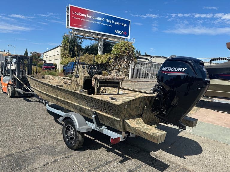 Lowe RX 1860 boat with Mercury outboard engine on trailer.