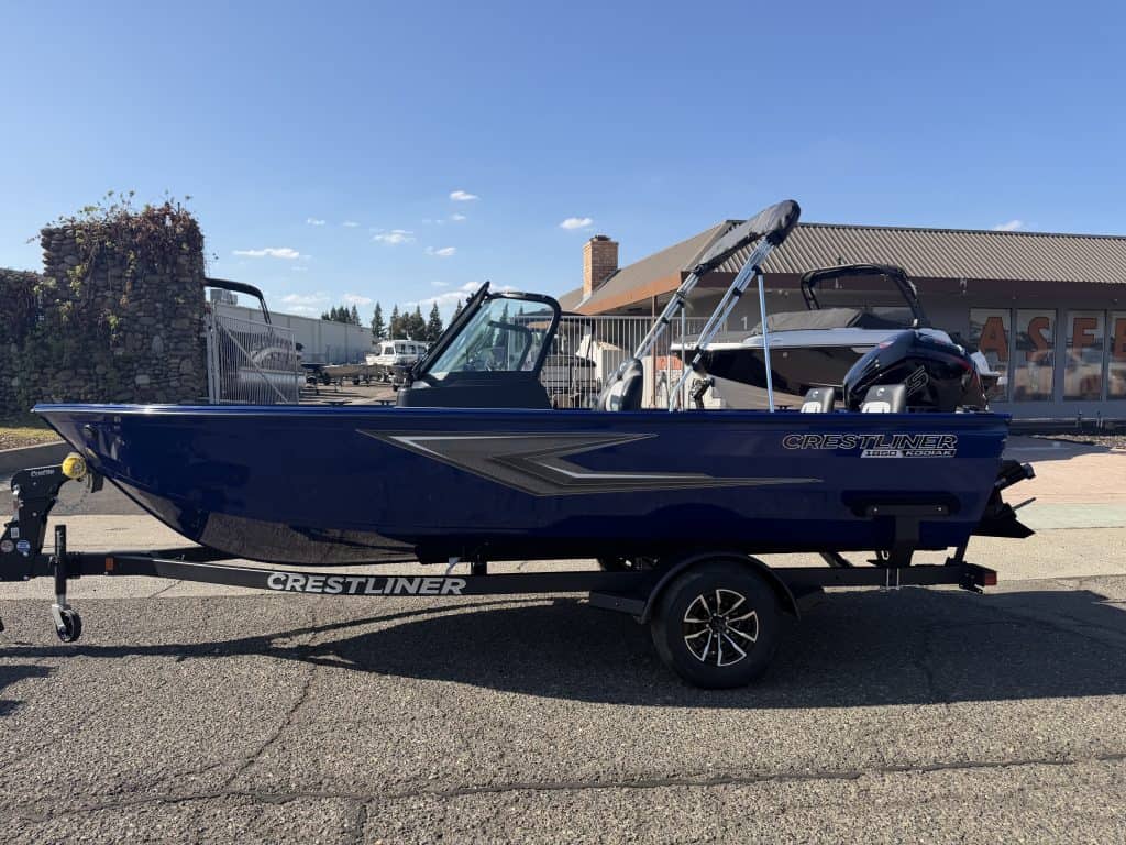 Crestliner 1850 Kodiak WT boat with Mercury Pro Xs 115HP engine on trailer.