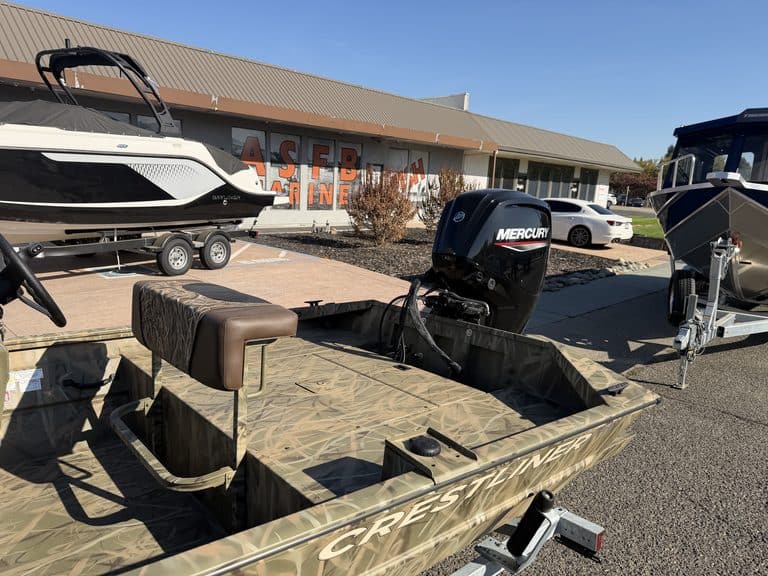 Crestliner 1860 Retriever CC fishing boat with Mercury motor.