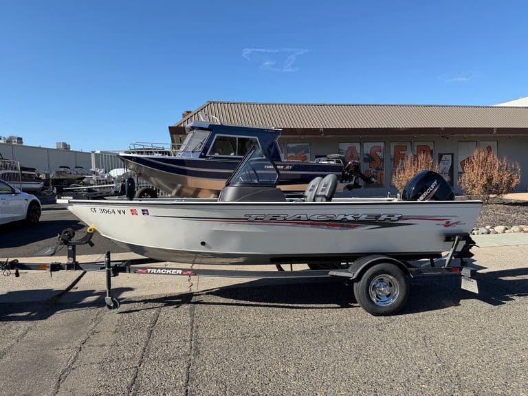 Tracker Pro boat on trailer at ASFB Marine dealership.