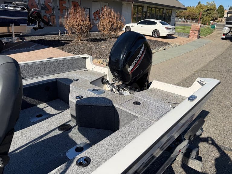 Fishing boat with Mercury 60HP outboard motor at ASFB Marine.