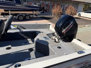 Mercury 60HP outboard motor on a fishing boat for sale.