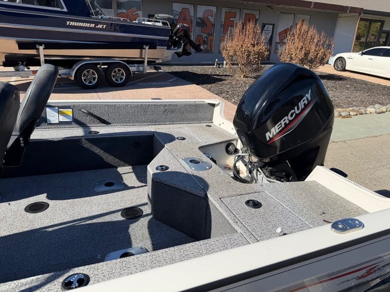 Mercury 60HP outboard motor on a fishing boat for sale.
